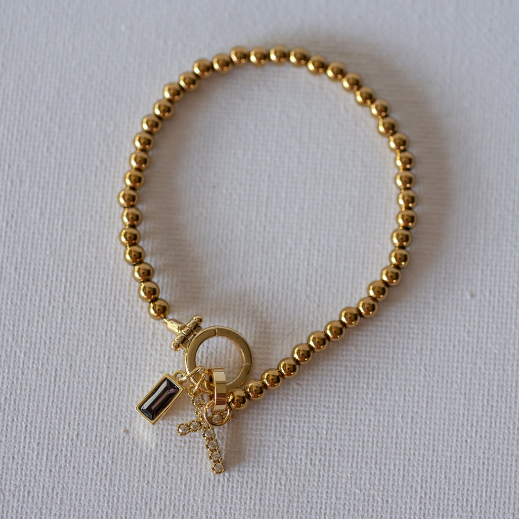 Beaded Bracelet with Cross Pendant and Birthstone - Bracelet