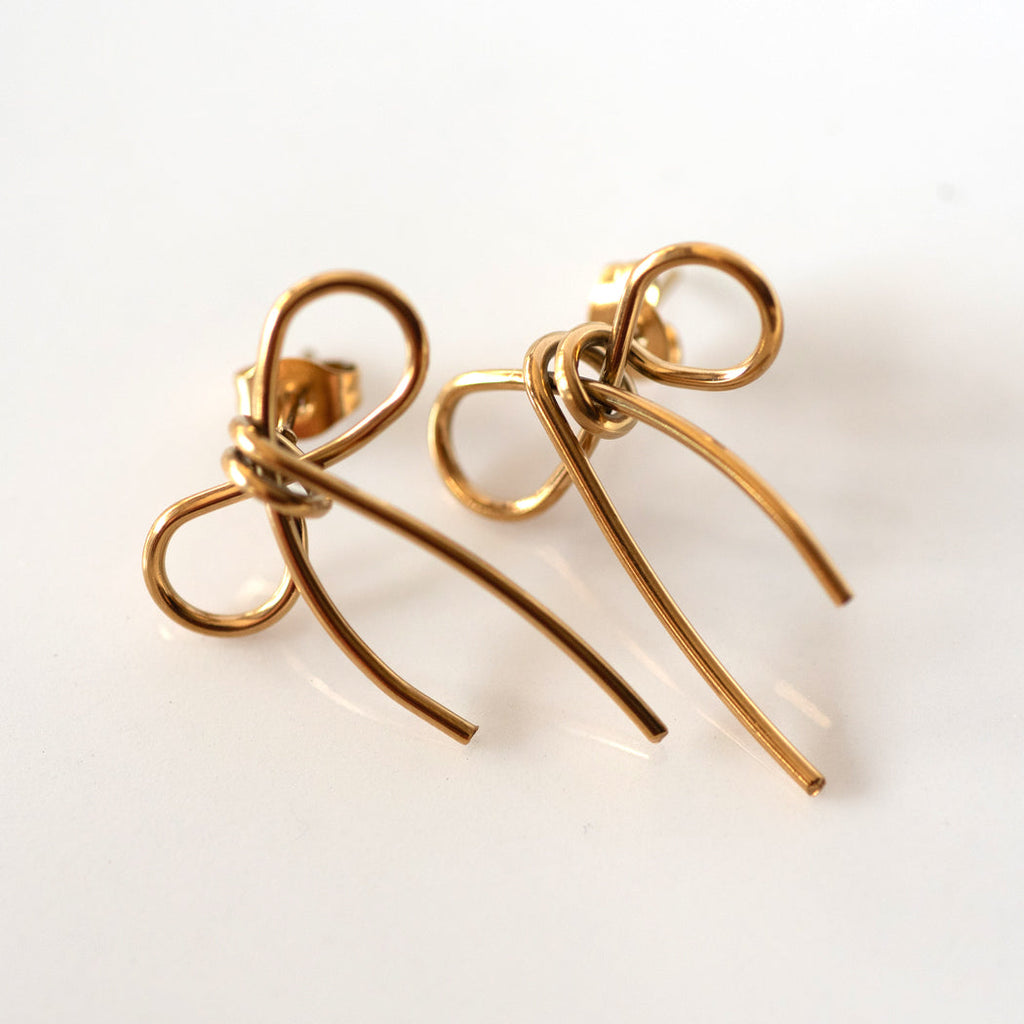 Golden bow stud earrings - Earrings
