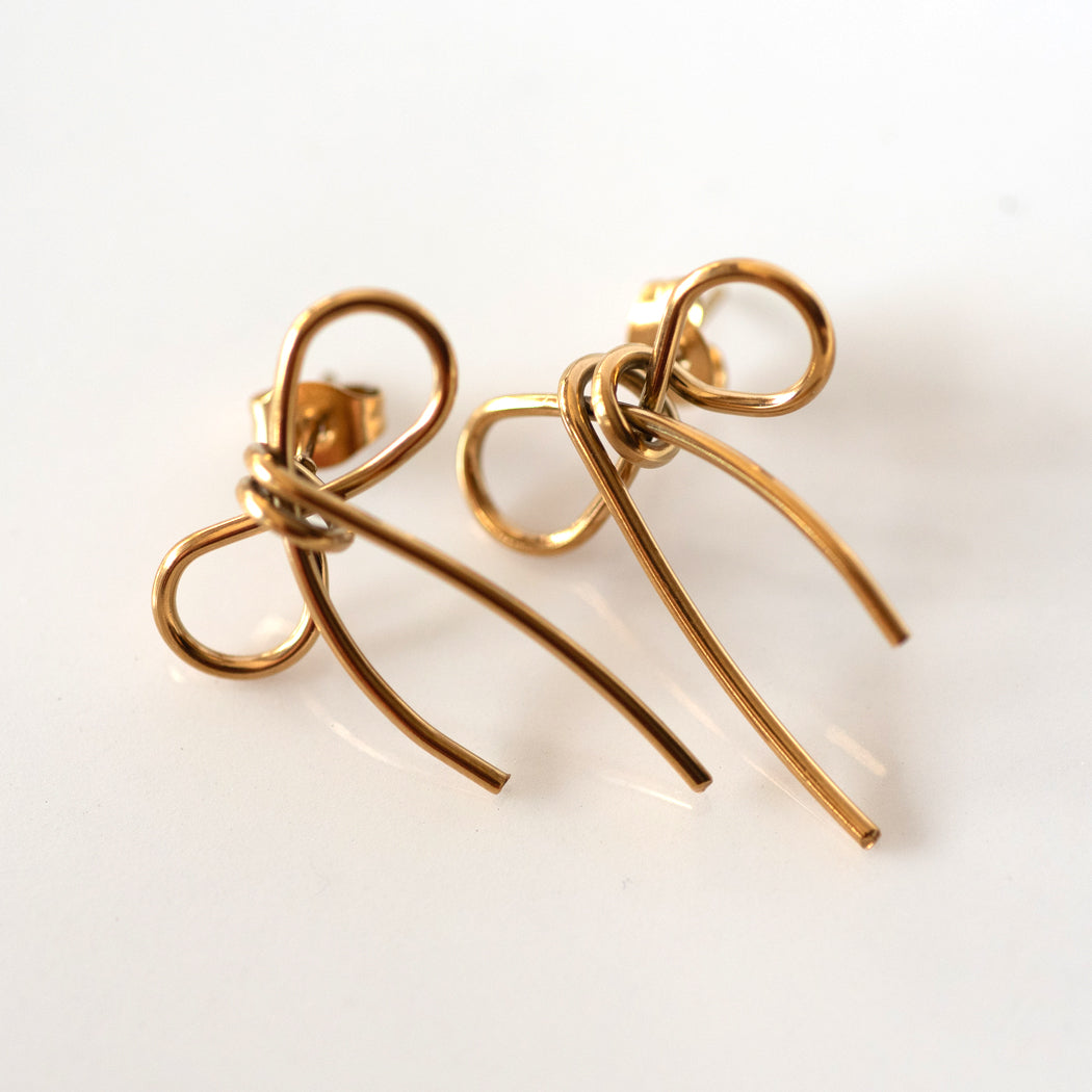Golden bow stud earrings - Earrings